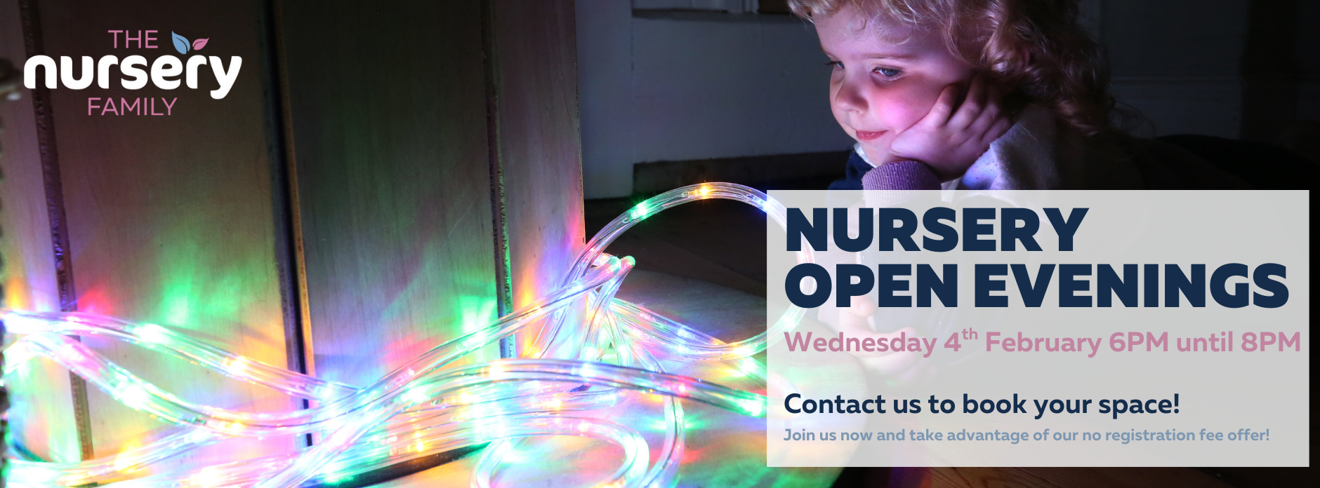 Child with curly hair engaged with colorful, glowing lights at The Nursery Family's open evening announcement.